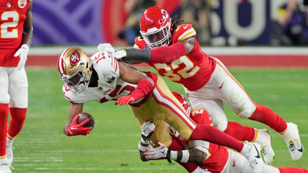 Feb 11, 2024; Paradise, Nevada, USA; Kansas City Chiefs safety Mike Edwards (21) and linebacker Nick Bolton (32) tackle San Francisco 49ers wide receiver Jauan Jennings (15) during the third quarter of Super Bowl LVIII at Allegiant Stadium. Mandatory Credit: Kyle Terada-USA TODAY Sports